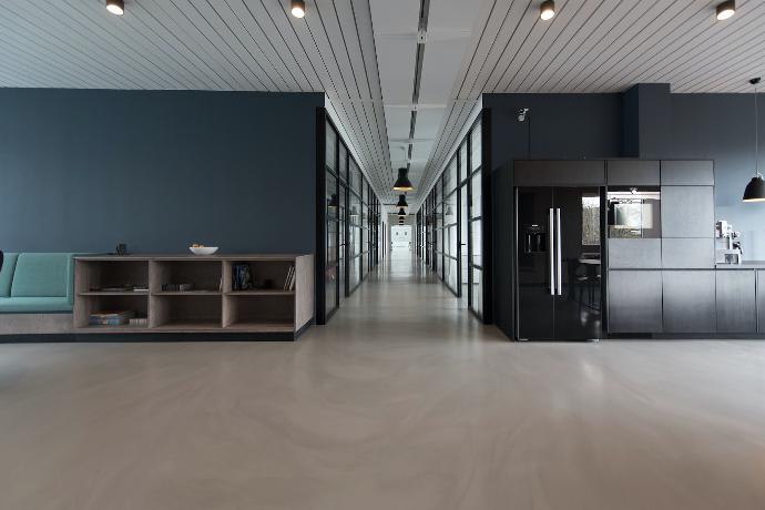 architectural photography of black and brown hallway